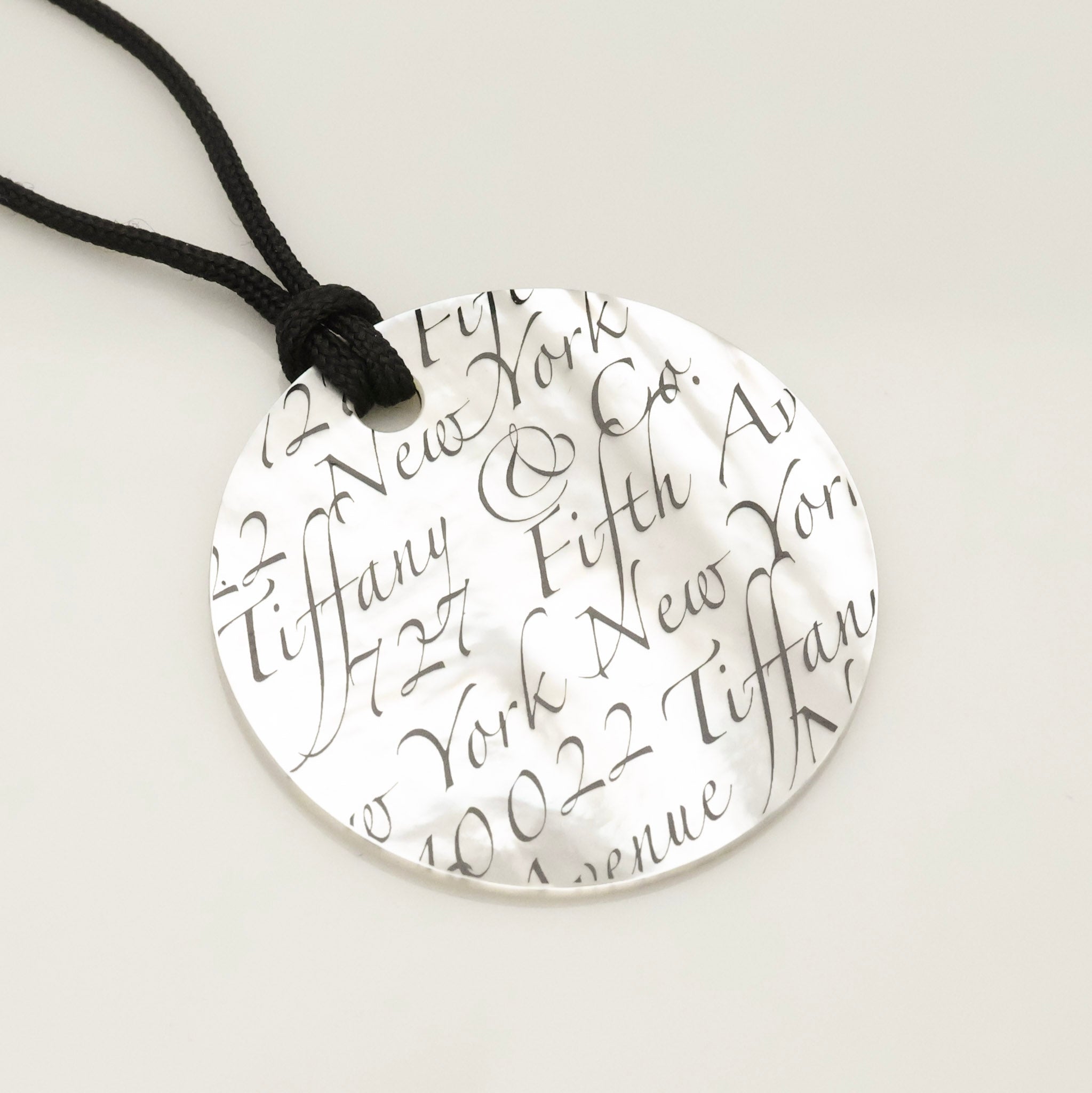 Tiffany & Co. Notes LARGE Round Shell Silk Cord Necklace Sterling Silver AG925