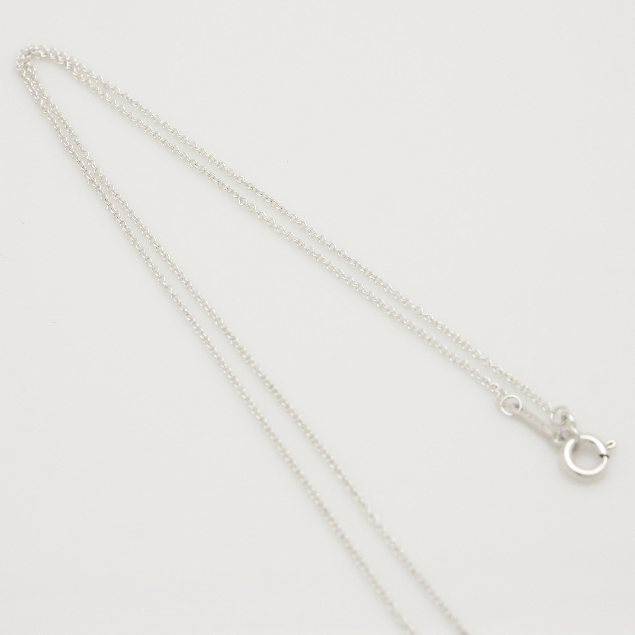 Tiffany & Co. Mini X Kiss Cross Pendant Necklace Sterling Silver 925 