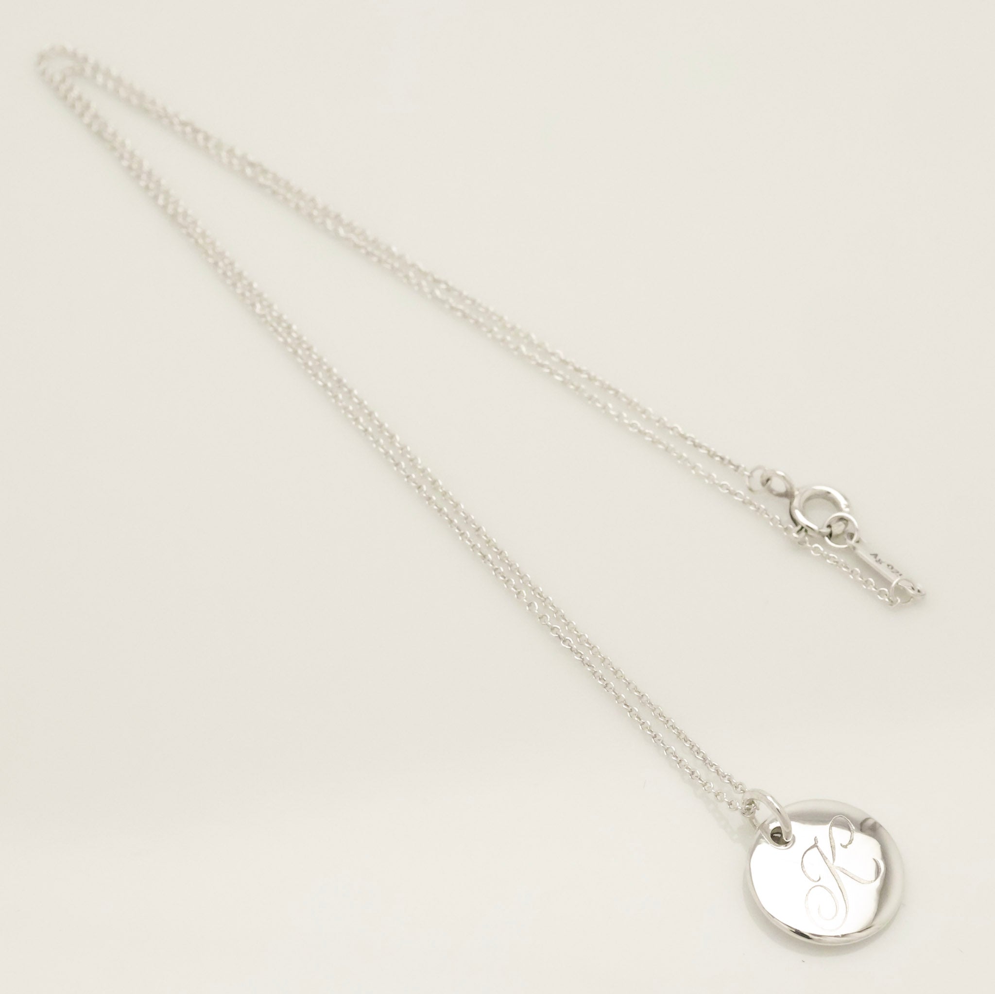  Tiffany & Co. Letter K Notes Initial Disc Necklace Sterling Silver 925