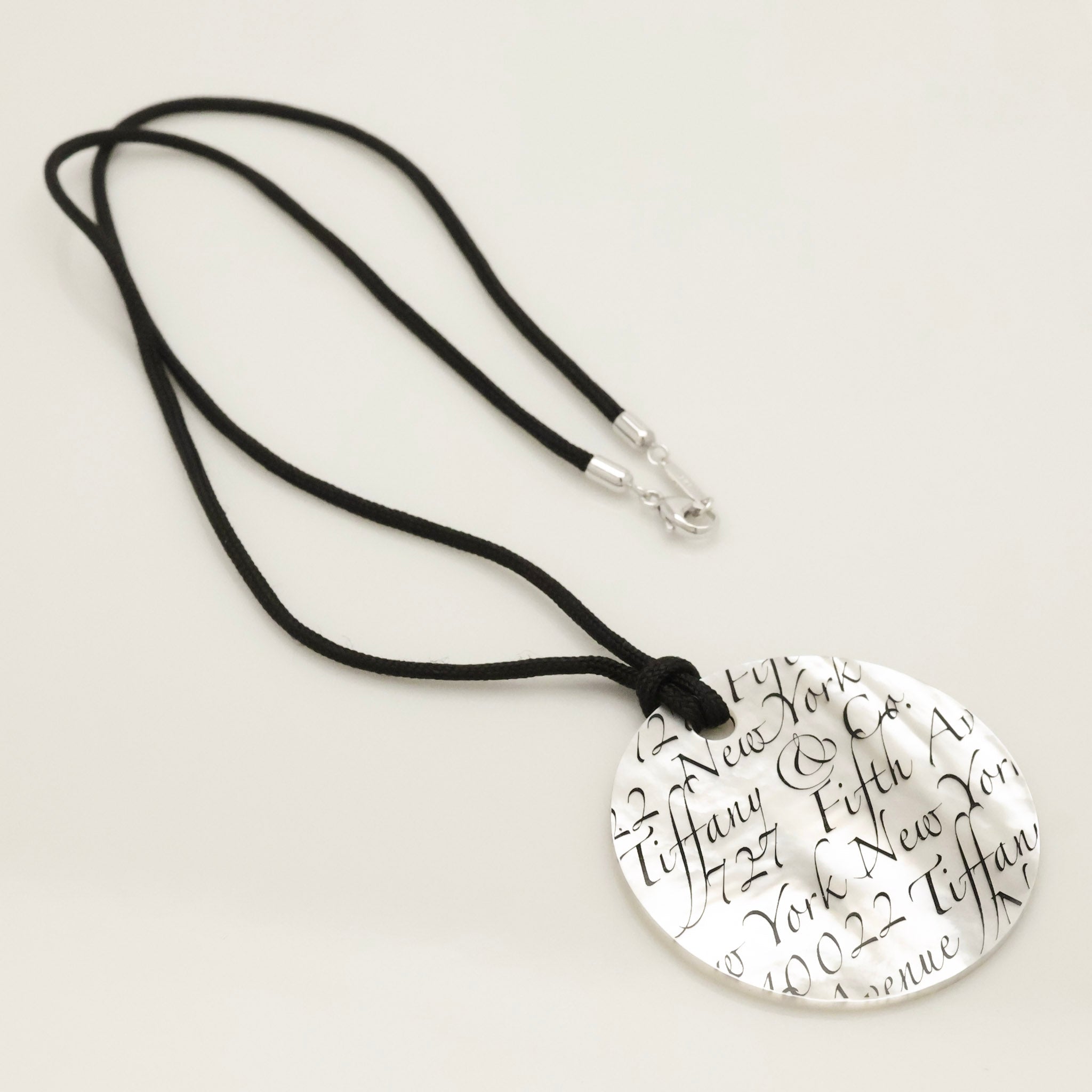 Tiffany & Co. Notes LARGE Round Shell Silk Cord Necklace Sterling Silver AG925