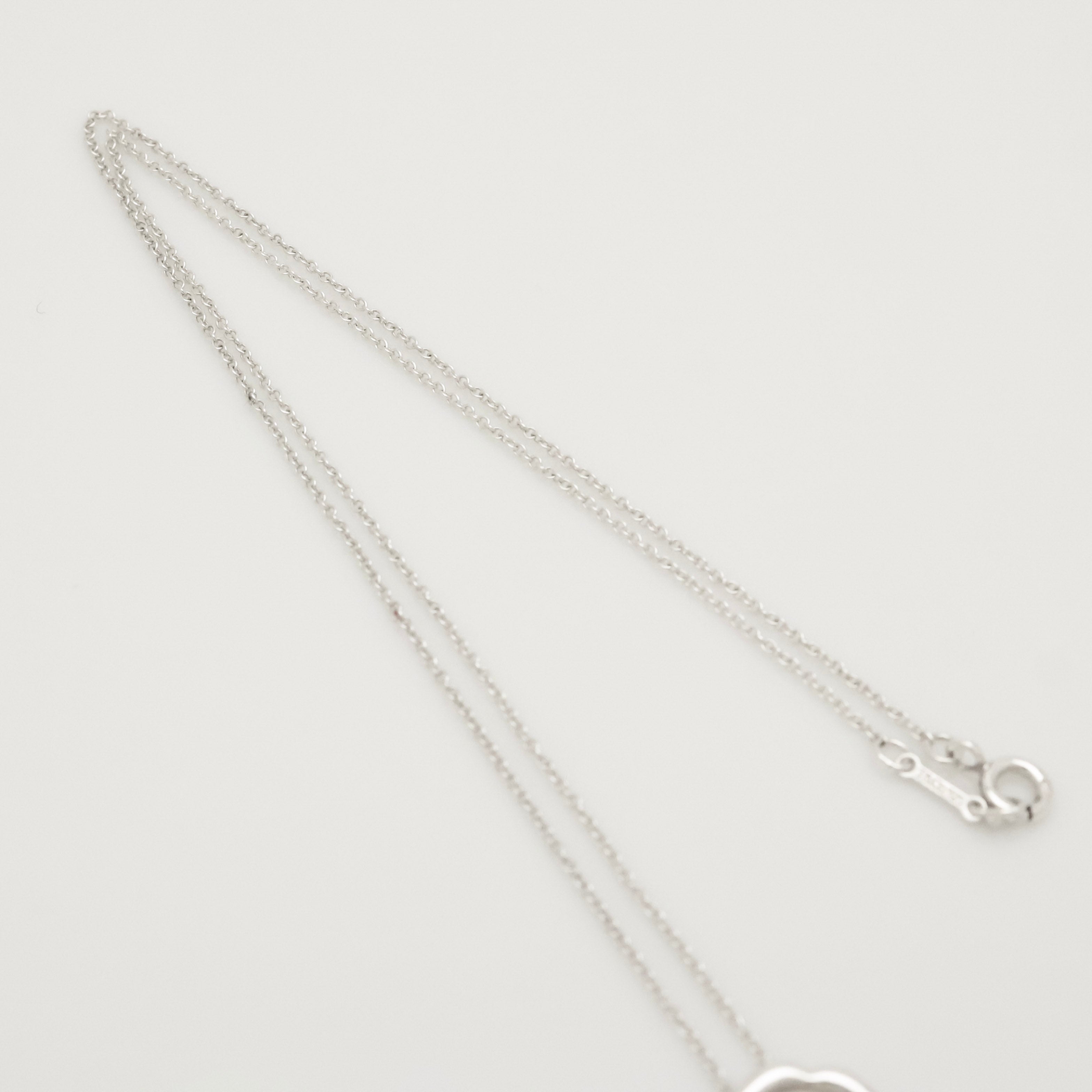 Tiffany & Co. Picasso Kiss X Sealing Stamp Necklace Sterling Silver 925
