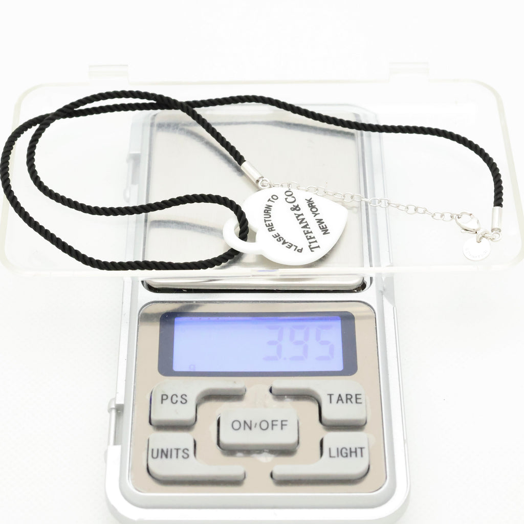 TIFFANY&Co. リターントゥ ティファニー ハート タグ ホワイト ボーン シルク コード ネックレス AG925