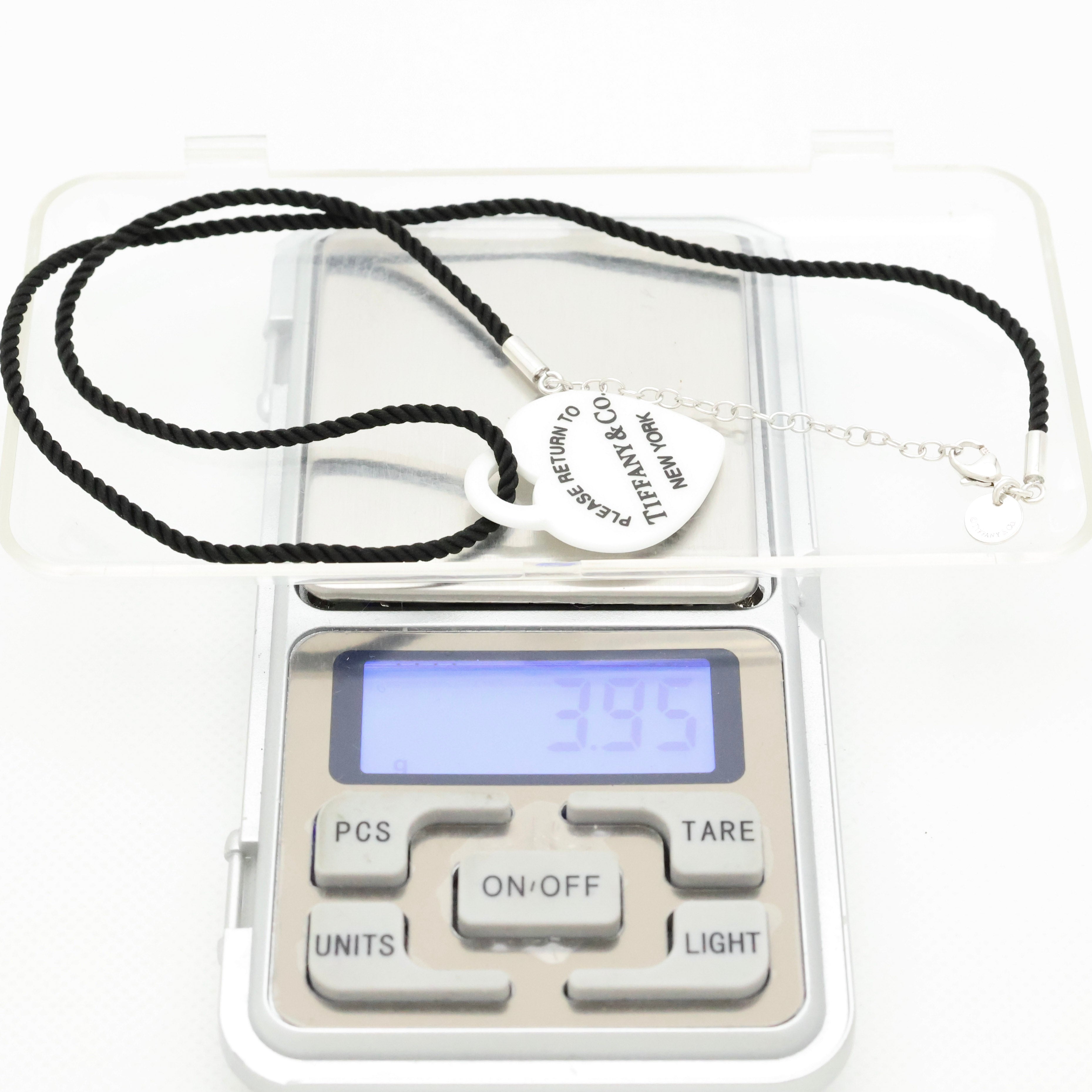 TIFFANY&Co. リターントゥ ティファニー ハート タグ ホワイト ボーン シルク コード ネックレス AG925