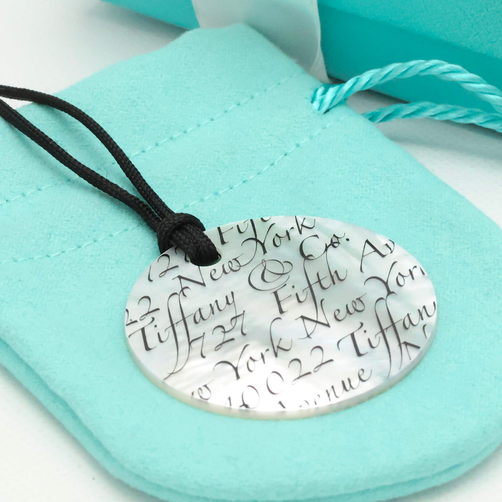 Tiffany & Co. Notes LARGE Round Shell Silk Cord Necklace Sterling Silver AG925