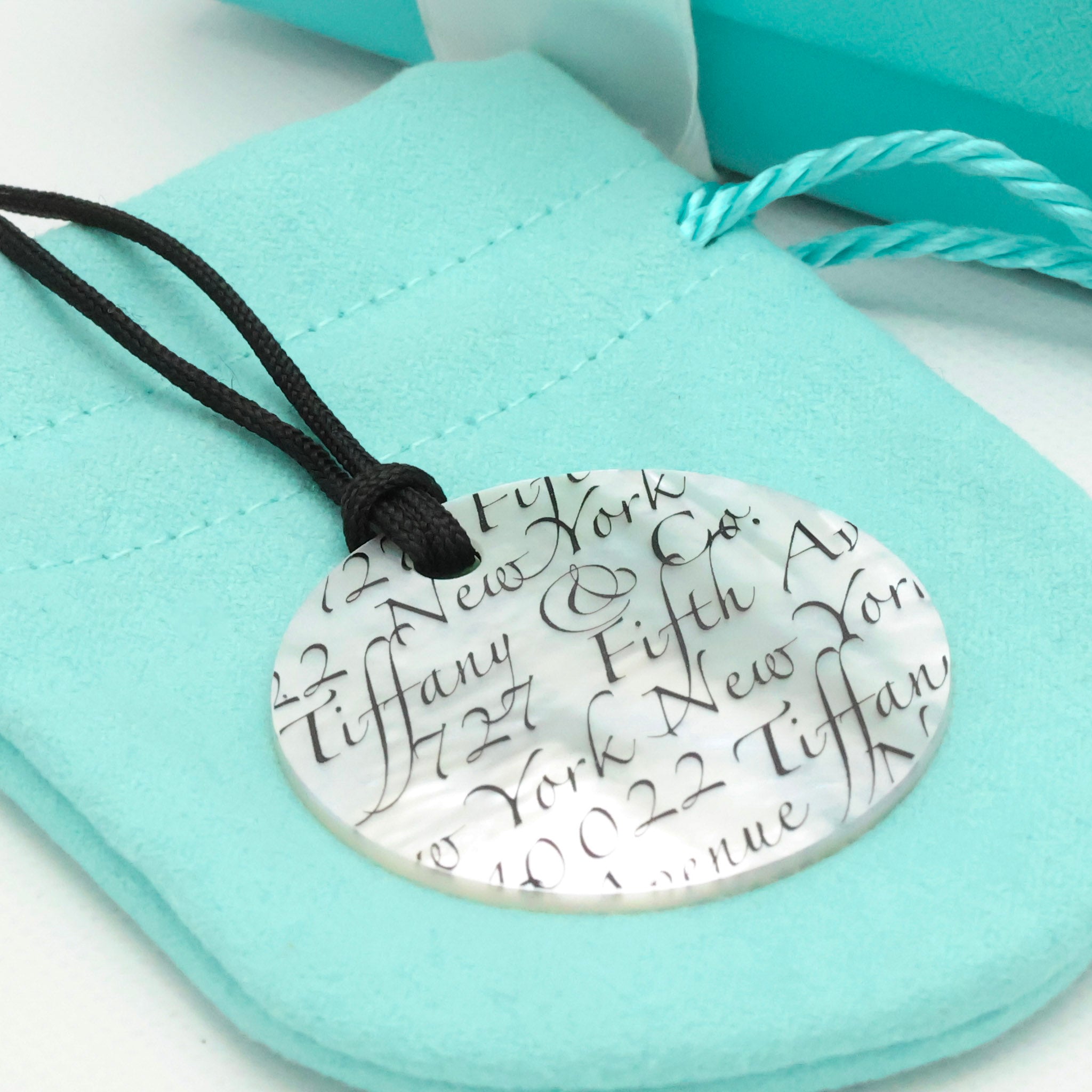 Tiffany & Co. Notes LARGE Round Shell Silk Cord Necklace Sterling Silver AG925