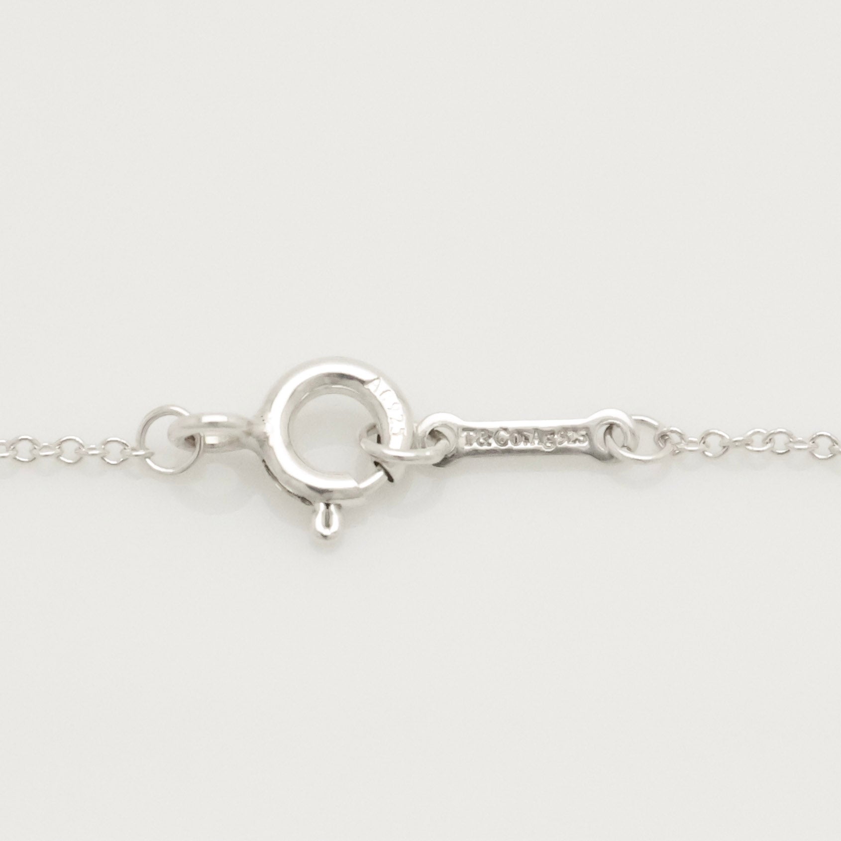 Tiffany & Co. Mini X Kiss Cross Pendant Necklace Sterling Silver 925 